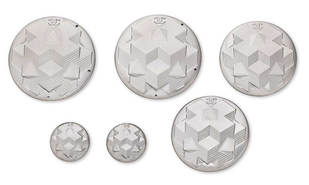 A SET OF 6 SILVER BUTTONS CHANEL
