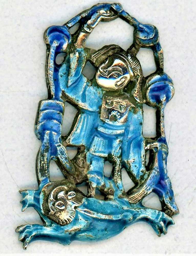 A pierced 19th C. silver and enamel figural button from China