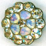 A medium size opalescent and strass jeweled button