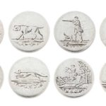 A SET OF EIGHT GEORGE III SILVER BUTTONS EACH ENGRAVED WITH HUNTING SUBJECTS