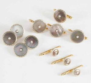 9-PIECE 10K YELLOW AND WHITE GOLD DRESS SET comprising a pair of cufflinks, 4 buttons, and 3 shirt studs