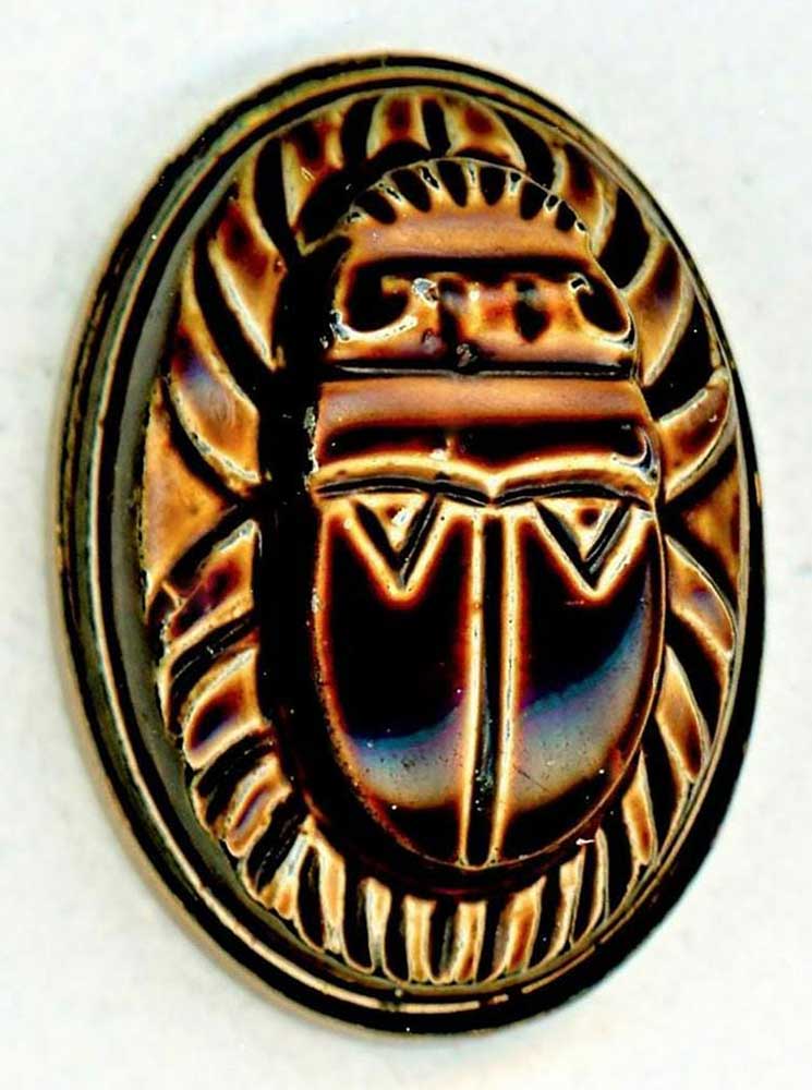 ONE DIVISION ONE HIGH RELIEF POTTERY SCARAB BUTTON