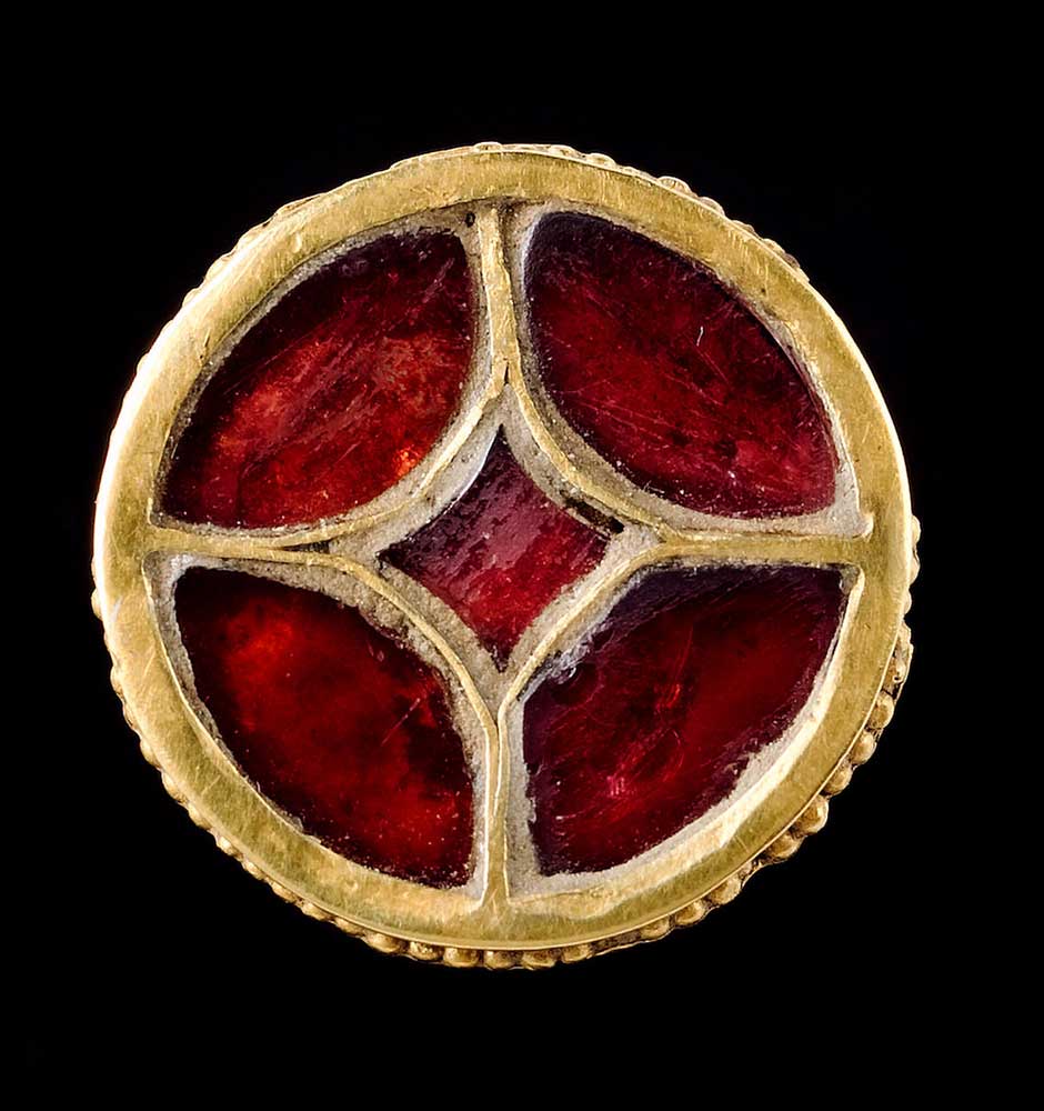 AN ANGLO-SAXON OR FRANKISH GOLD AND GARNET BUTTON